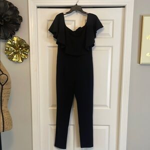 Sugarlips Black Jumpsuit with Ruffled Cap Sleeves and Sweetheart Neckline